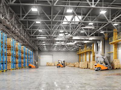 forklifts in large warehouse